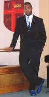 05A_Black_Suit_RoyBGSqT_in_Church.jpg (270423 bytes)